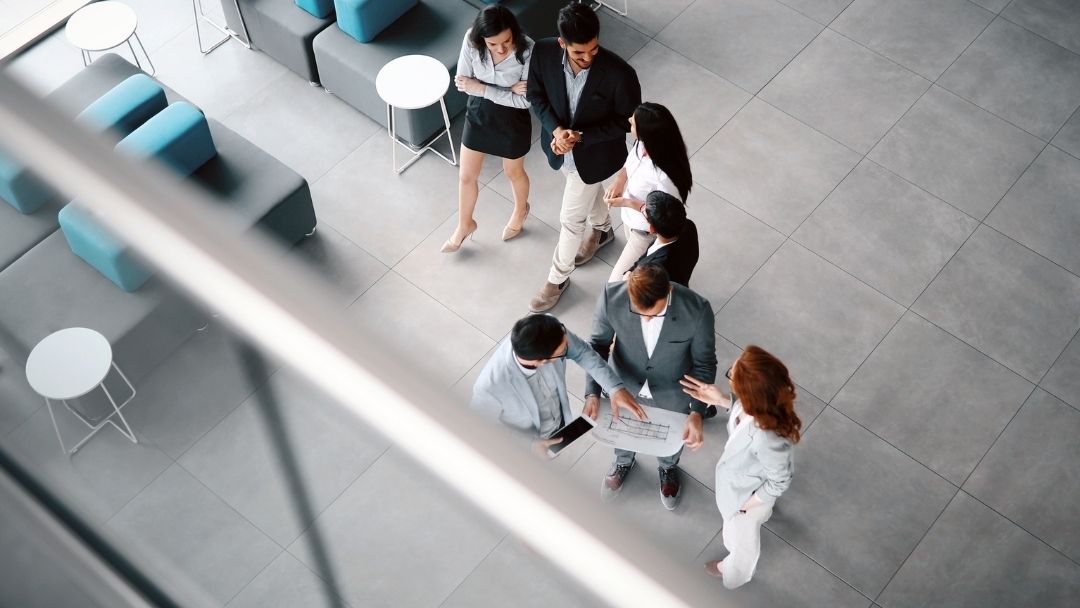 A group of people talking together.